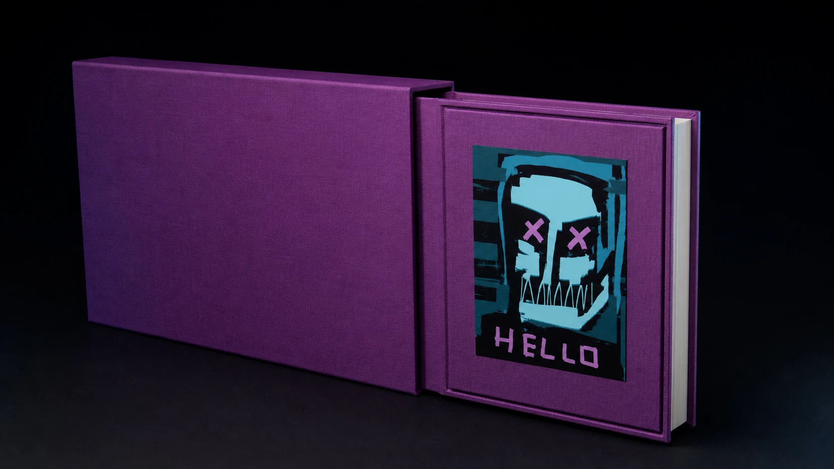 Purple XCOPY hardcover art book with a matching slipcase